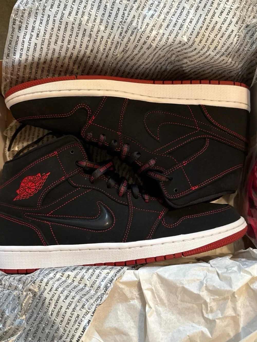 Jordan Black and Red Mid-Top Sneakers fearless edition